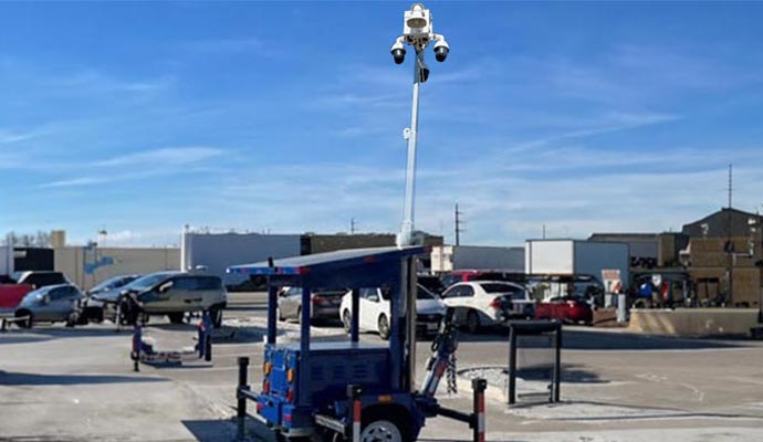 Mobile surveillance trailer at public festival parking lot