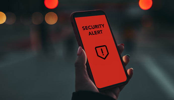 A smartphone displaying security alert